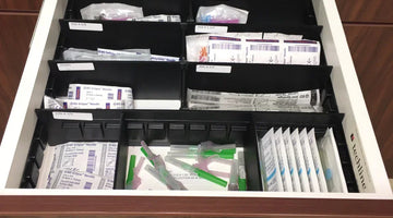Black file kit at desk