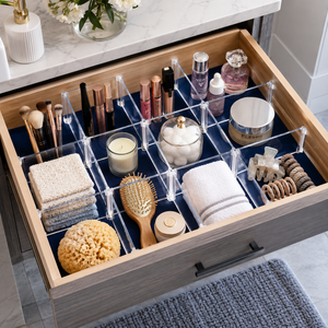 See how clear acrylic drawer dividers turn cosmetic chaos into a salon-style, see-everything drawer.