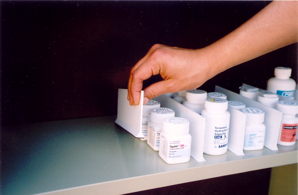 Pharmacy magnetic draw dividers